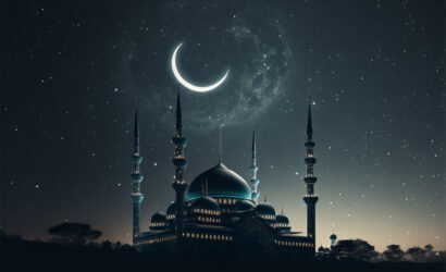 Mosque silhouette in night sky with crescent moon and star.