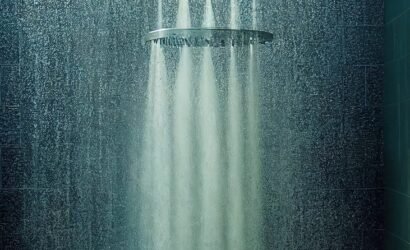 Dark shower room with flowing water