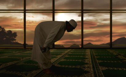Portrait of asian muslim man praying on the mosque